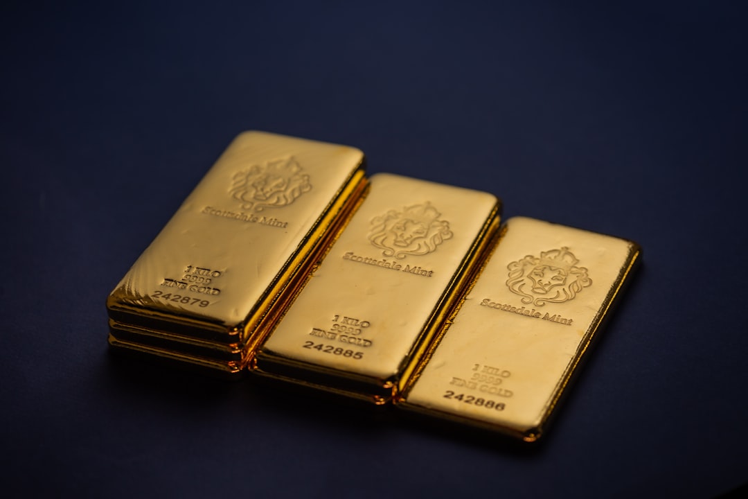 gold bullion bars oil barrel investment 2026
