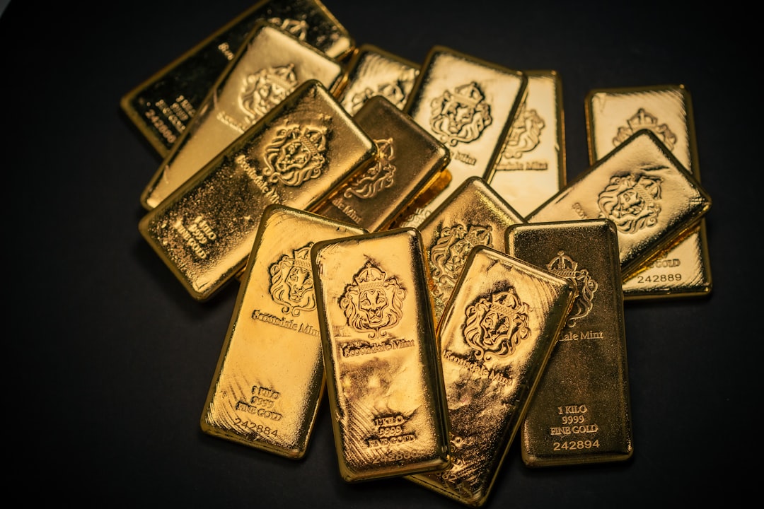 gold bars inflation hedge commodities 2026, precious metals investment portfolio